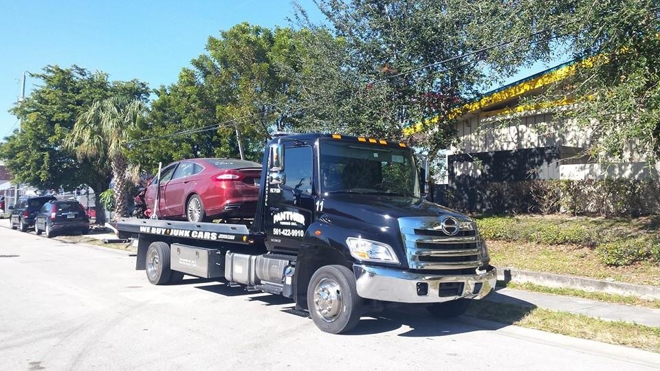 Panther Towing truck on the road